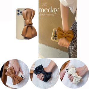 Luxury PU Leather Bowknot phone Cases Hand Grip Strap Wrist Chain For iPhone 13 12 11 Pro MAX 8 7 Plus SE2 Woman Girls Soft TPU Slim Protective Cover