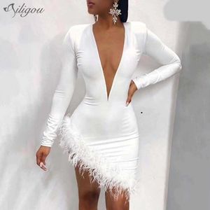 Abito da donna autunno di alta qualità Bianco scollo a V manica lunga Orlo in piume Fasciatura in rayon Festa sexy 210527