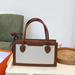 2022 Alta Qualidade Owhide Messenger Tote Bolsa de Capacidade Letra Letra Lista de Lona De Couro Genuíno Zíper Duro Saco Sólido Mulheres Designer Bolsas MM GM Brown