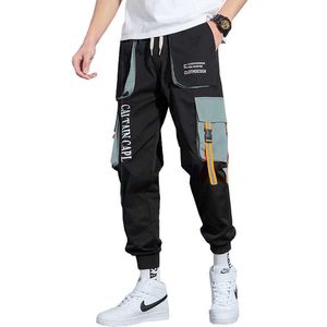 Pantaloni stile harem da uomo 2021 pantaloni hip-hop nastri jogger pantaloni moda casual pantaloni streetwear pantaloni sportivi harajuku Y0927