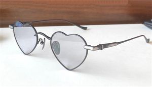 Neue Modedesign-Frau-Sonnenbrille 8063 Retro herzförmiger Metallrahmen einfacher und beliebter Stil hochwertige UV400-Schutzbrille