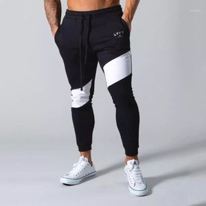 Mens Jogging Calças Fitness Homens Sportswear Tracksuit Casual Bottoms Skinny Sweatpants Calças Gyms Jogger Track Masculino