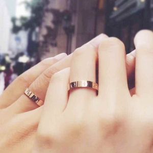 High Polished Top Quality Designer Lover Ring Logo Printed Classic Style Men Rings Gold Silver Rose Colors Stainless Steel Women Jewelry Wholesale