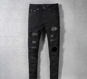 Jeans da uomo desinger classici pantaloni hip-hop stilista pantaloni da motociclista strappati effetto consumato jeans slim fit da motociclista