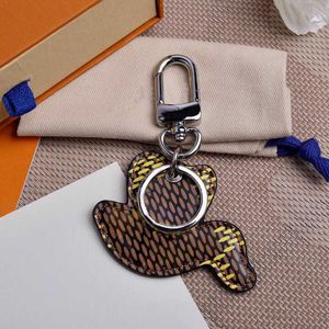 Marka yüksek kaliteli moda kadın adam anahtarlık moda el yapımı anahtarlık alaşım şık toka ünlü tasarımcı lüks anahtar zinciri el58