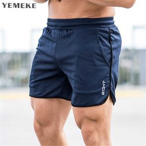 Męskie spodenki Długość łydki Siłownie Fitness Bodybuilding Casual Joggers Trening Marka Sportowe Krótkie Spodnie Spleciane Sportswear 210622