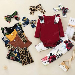 子供の服は女の子の花の花服を着て幼児のフリル飛行スリーブトップス+花のヒョウプリントパンツ+ヘッドバンド3pcs /セット春秋の赤ん坊の服