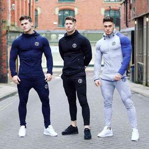 Man som kör uppsättningar män sport kostymer hoodies byxor sätter sweatshirt sweatpants sportkläder gym fitness tracksuit manliga casual joggare y1221