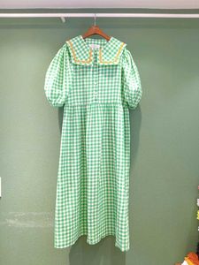 夏のyongスタイルのピーターパンの襟の甘い格子縞のパフスリーブミッドカーフドレス210615