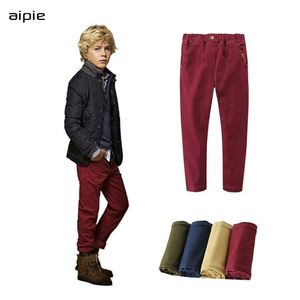 I nuovi bambini di promozione ansimano i pantaloni del ragazzo del cotone di elasticità dei pantaloni dei bambini casuali classici di colore solido che coprono 210306