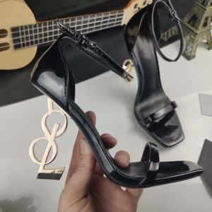 Lyxig designer YY Paris Metal Brev Sandaler Kvinnor Klänning Skor Mode Äkta Läder SL Sexig Öppna Toe High Heels Bridal Bröllop Bankett Toppkvalitet med Box DFSD