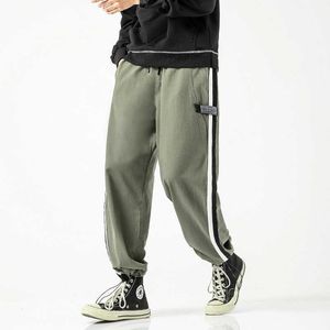 Pantaloni da jogging streetwear hip-hop Pantaloni da uomo larghi Pantaloni harem Pantaloni alla caviglia Sport Pantaloni sportivi casual Moda Uomo Pantaloni casual Y0927