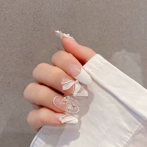 Owalne francuskie fałszywe paznokcie długie naciśnięcie na 3D muszka fałszywe paznokcie z wzorów okrągły akrylowy biały klej na kobietom i dziewcząt