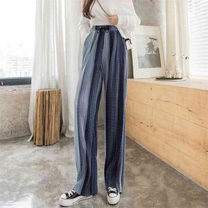 Duży rozmiar kobiece Czeski Drukowane Nieregularne Split Fashion Casual retro elastyczna talia była cienkie spodnie z szerokim nogami 210925