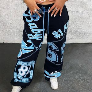 Fashion Casual Harem Pants Overdimensionerade mönster tryckt Löst breda ben Kvinnors dragkant Svettbyxor 220211