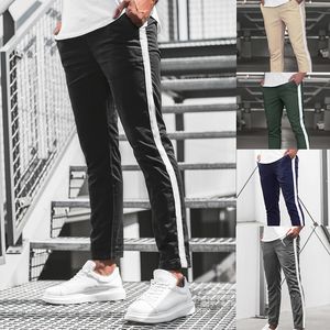 Casual Pants Mężczyźni chude spodnie Śledź dna dres siłowni Fiess Man Pant Side Stripe Modne Joggers