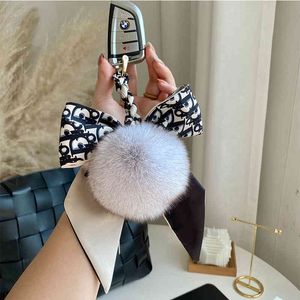 Real Fox Fur Silk Scarf Bow Ball Poms Keychain Women Plush Pompom Keyring Handbag Decoration Emo Trinkets Jewelry Doll Gifts