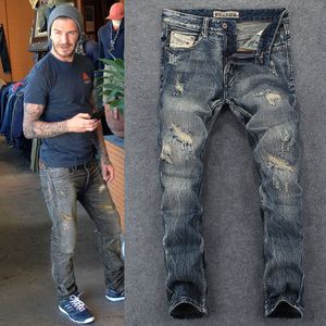 Europeiska amerikanska retro jeans herrar i tiggars gamla lapp lös raka långa byxor personlighet mode märke lokomotiv