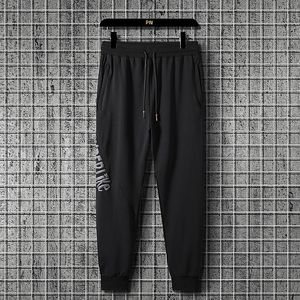 Jesienna wiosna czarna szara nylonowe spodnie dresowe spodnie dresowe joggery dresowe sport sportowy haruku spodni męski moda