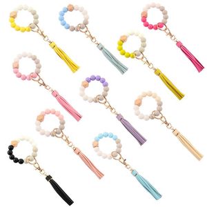 Silikonpärlor Keychain Tassel String Chain Party Favor Läder Tassels Hängsmycke Trä Bead Bracelet Key Ring Morandi 19 Designs att välja GYL25
