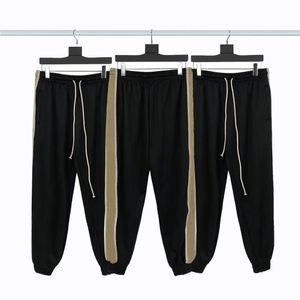 Calças masculinas de grife França roupas mais recentes Cor Jacquard letra Homens calças de jogging Casual Itália Ajuste fino Letras de corpo inteiro correndo Calças de casamento