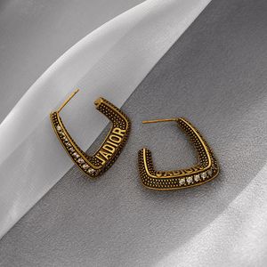 Luxus Schmuck Ohrringe Wind Damen Micro Inlaid Zirkon Bronze Temperament Personalisierte Ohrringe als Geschenk