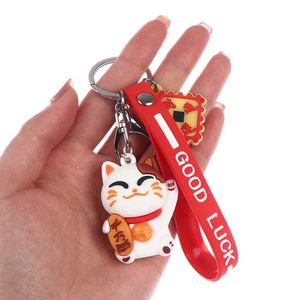 1pc söt mode nyckelkedja söt lycklig katt nyckelkedja pvc keychain maneki neko bil nyckelring väska hänge g1019