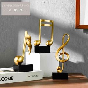 Heminredning Tillbehör Figurin Dekorativ konst Statuette Golden Musical Note Hantverk Living Room Wine Cabinet Desk Ornaments 210924
