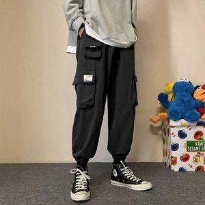 2021Men Fashion Hip Hop Cargo Pants Trend Hot Punk Style Mens Clothing Black Grey Harem Pants Multiple Bigger Pockets Decoration Y0811