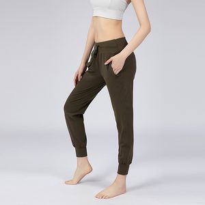 Calças de ioga femininas com bolso lateral e elástico para corrida e treino, calças esportivas com bolso lateral
