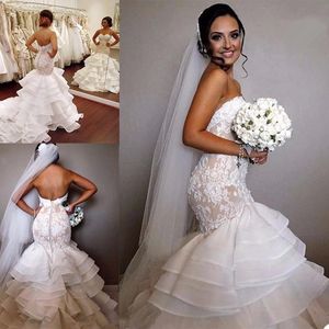 Vestidos de sereia em cascata ruffles renda apliques de decote em coração butões cobertos de trem de decote em casamento vestido de noiva vestido 403