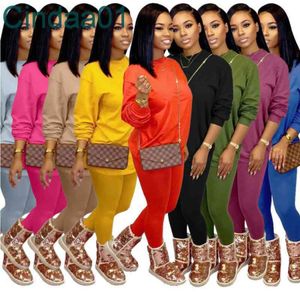 Designer Women Tracksuits Två stycken Sätt avslappnad långärmad leggings kläder för fast färg damer Lossa T -shirt joggingkläder