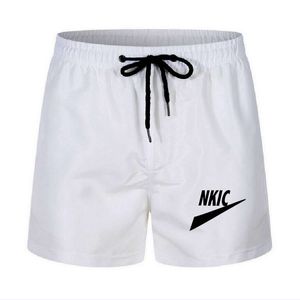 Homens Casual Quick Calças Calças Calças Bolos Beach Marca Logotipo Branco Preto Esporte Shorts Verão Masculino Pant com Bolso Respirável