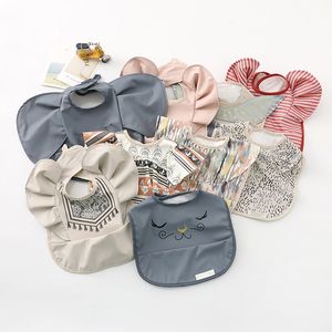 Babybibs ​​med vingar Soft PU Vattentät Snuggle BIB Burp Cloths Carrier Peoch Småbarn Spädbarnsutrymme