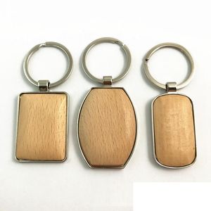 Creative Metal Wooden Keychain Hjärtformad elliptisk Favär Key Buckle Keychains Bag Car Pendant Party Favors WLL214