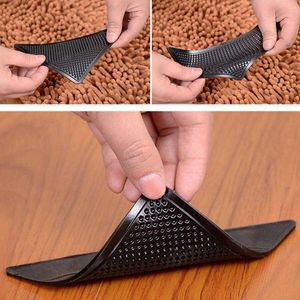 4Pcs/lot Triangle Reusable Anti-skid Rubber Mat Non Slip Patch Mat Washable Rug Gripper Stopper Tape Sticker Black Corners Pad Y0803