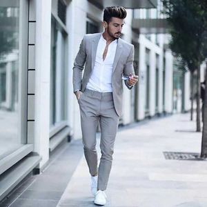 （ジャケット+パンツ）2021カジュアルなファッション豪華なビジネス男性のスーツのためのウェディングスーツ男タキシードスリムフィットピークラペルピンクの男性スーツx0909