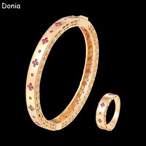 Donia Jewelry Luxus-Armreif, vierblättrige Blume, übertriebenes Titanstahl-Armband, mikroeingelegter farbiger Zirkon, europäischer und amerikanischer Modedesigner