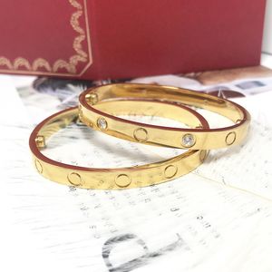 Tamanhos masculinos/femininos Estilos clássicos de alta qualidade Snap Bangles titânio joias de aço banhado a ouro braceletes masculinos e femininos pulseira de casal melhor presente