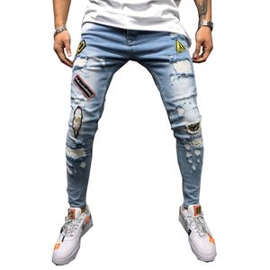 Mäns Jeans European And American Four Seasons Style Hip-Hop High-end Tight-passande Ripped Feet Pants Badge