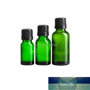 Bottiglia di olio essenziale in vetro verde da 10 ml 15 ml Imballaggio cosmetico schermato dalla luce da 30 ml Miscelazione vuota