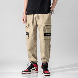 Nowe Męskie Harajuku Harem Spodnie 2021 Kombinezony Mężczyźni Streetwear Black Cargo Spodnie Mężczyzna Luźna Moda Hip Hop Joggers Spodnie 3XL X0723