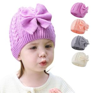 Зимние шапки для младенцев, теплые вязаные шапки с бантом для маленьких девочек, вязаные крючком, DD261