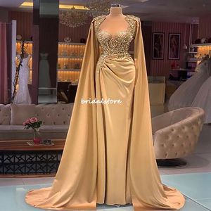 Lyx Arabisk Dubai Evensk klänning med Cape Sleeves Sheer Neck Mermaid African Prom Klänningar 2022 Med Beaded Pearls Gold Party Gowns Abaya Formellt Tillfälle Slitage