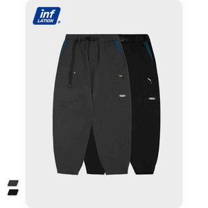 Inflação Calças de carga de Streetwear para homens casuais soltas calças pretas com bolsos na moda corredores ao ar livre calças com cinto 13075W H1223