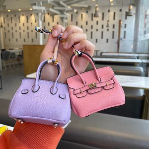 Hbp aksesuarları çanta mini totes çanta kız çocuk çantası tasarımcısı anahtarlık araba anahtar tutucu halkalar çanta lüks çanta çanta kanca kılıfları kulaklık bayan debriyaj dicky dicky0750