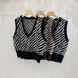 V-pescoço em v colete de malha mulheres outono coreano moda zebra padrão sem mangas camisola colete para desgaste exterior 211008