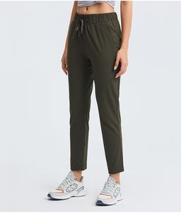 L154 Pantaloni da yoga in tessuto elastico Pantaloni con due tasche laterali Pantaloni da allenamento da donna Calzamaglia sportiva da esterno Pantaloni sportivi da corsa