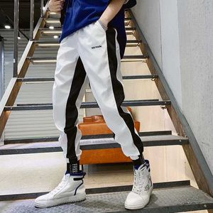 Hiphop streetwear män harem lastbyxor koreanska jogger sweatpants fast färg svart vit ankel längdbyxor m-xxl q240217