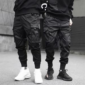 Hip hop boy multi-pocket elastisk midja design harem byxa män streetwear punk casual byxor jogger man dans svart byxa 210723